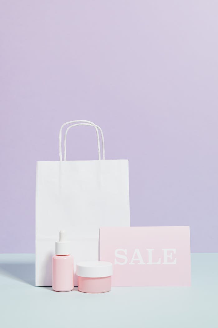 journey Elegant beauty product display with sale sign and shopping bag in minimalist style.